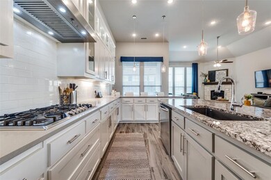 Huge kitchen with tons of cabinets and gas cooktop!