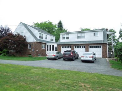 Apartment above 3 car garage.