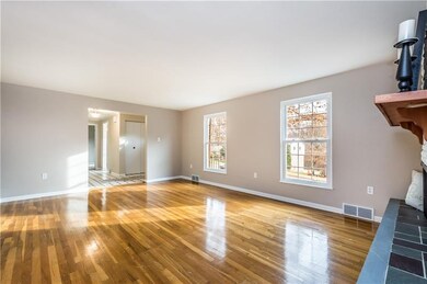 This home offers original oak hardwood floors thro