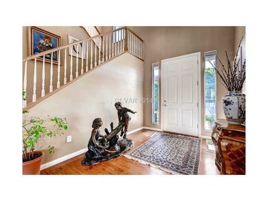 Property Photo. Entrance and staircase