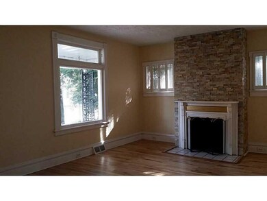 Living Room. Stone wall fireplace!