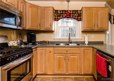The kitchen, which is open to the family room, has
