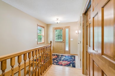 Open Entry With Maple Hardwood Floor