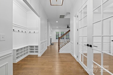 Foyer, Drop Zone to Left, Office/DR to Right