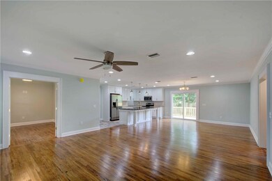 Large front entry into family room.   This 3/4 Oak