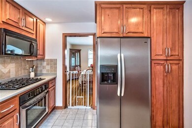 Newer stainless steel appliances and a pantry with