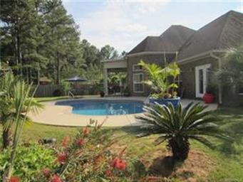 You will never want to leave this awesome backyard