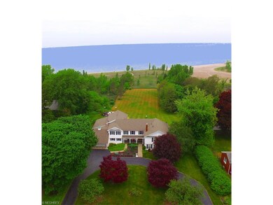 Aerial of Front Exterior Driveway, Property, & Lak