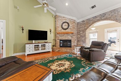 High ceilings and wood burning fireplace.