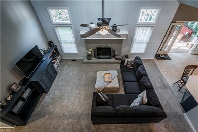 impressive  great room view from above loft.  An a