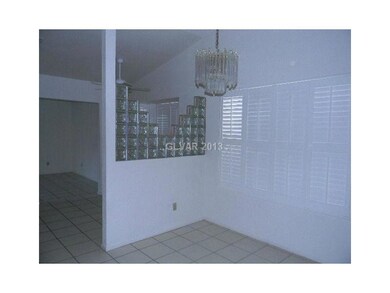 Dining Room. DINING AREA WITH BOTTLE GLASS ACCENTE