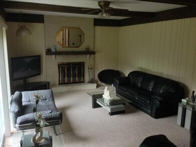 Nice family room with a woodburning fireplace