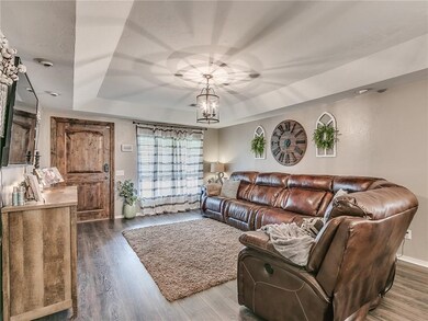 first floor living room, notice the tray ceiling, 