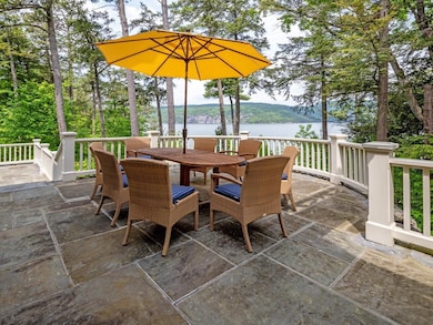 Upper stone patio w/lake views