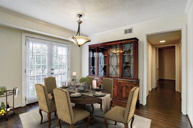 Virtually staged Dining Room.