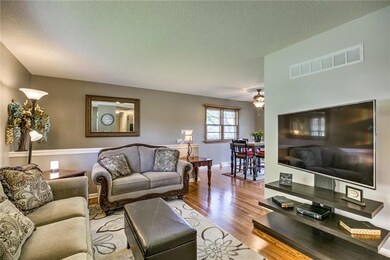 Comfy living room to sit around with guests and ha