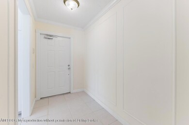 03_7854PineIslandWay_32_Foyer_Custom_Res