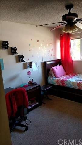 One of 3 upstairs bedrooms with spacious closets
