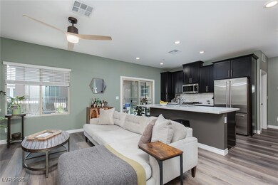 Living area featuring recessed lighting, wood fini