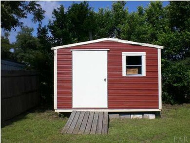 Rear yard storage building.