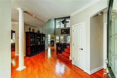 Foyer flows into open floor plan.