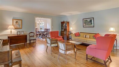 Spacious Living Room opens to Dining Room