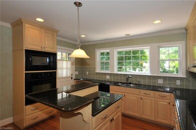 Kitchen overlooks private yard