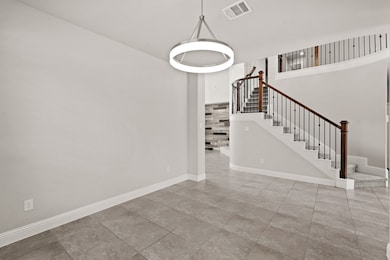 The formal dining space is like a luxurious retreat within the home. With its own designated area, it offers a sense of occasion and elegance for special meals and gatherings.