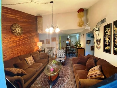 Cozy living room with warm wood accents, plush bro