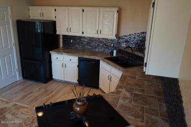 Kitchen With Tile Counters