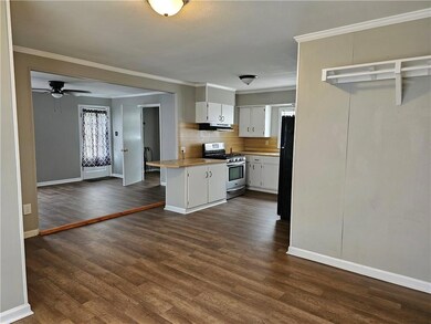 view from dining room to kitchen and living