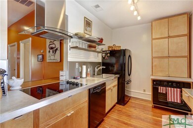 Galley Kitchen Open to Living Area