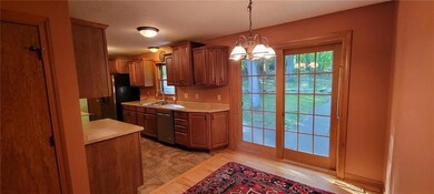 Sliding French door opens to secluded backyard.