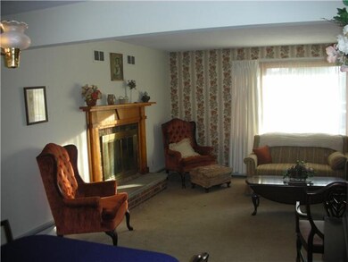 Living Room. Bright livingroom with wood burning f