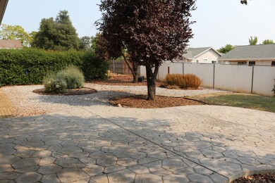 Stamped patio, excellent fencing