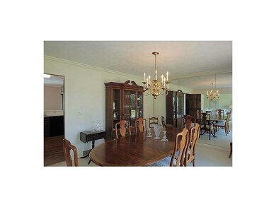 Formal Dining Room. Swinging door to close kitchen