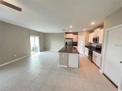 31454 Barrel Wave Way, Wesley Chapel, FL 33545 - photo 4