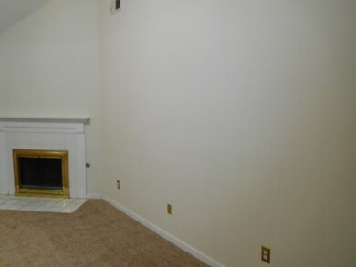 Great room with corner fireplace NEW Carpet + NEW 