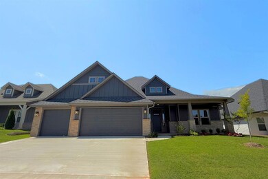 Covered front porch, fully sodded yard with sprinkler system, beautiful landscape package, doorbell camera, designer steel garage doors with two remotes, and keyless front door lock.