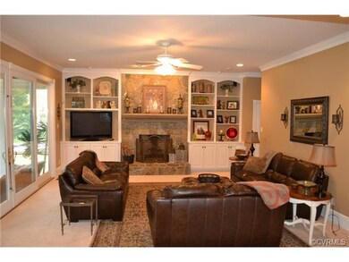 Sunken, crown molding, stone/gas fireplace, built-