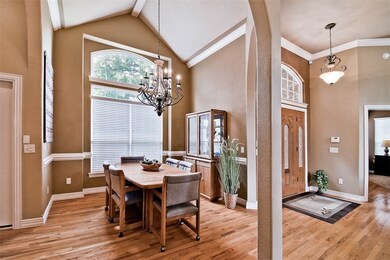 Formal dining space with massive windows and natural light. Fantastic cathedral ceilings.