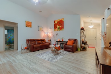 Cozy living room ceramic tile flooring.