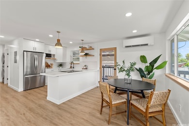 Secondary door to the carport is an added convenience.