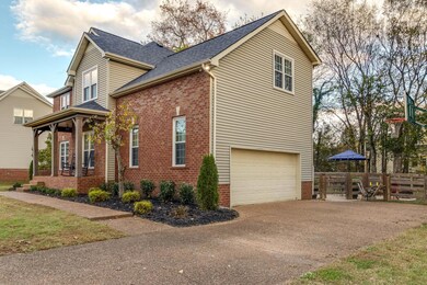 2 car side entry garage offers added shelving over garage doors for extra storage.