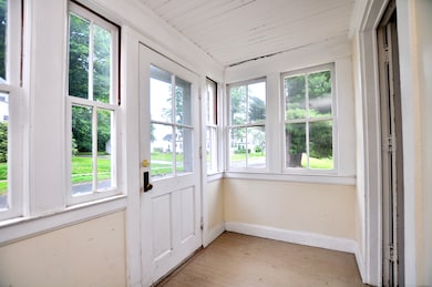 Front entry sun porch/mud room