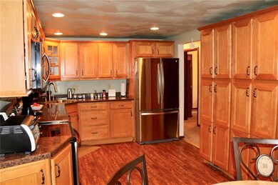 Kitchen has been fully updated with cabinetry that