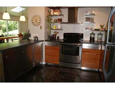 Kitchen. The stainless cabinets (include in-cabine