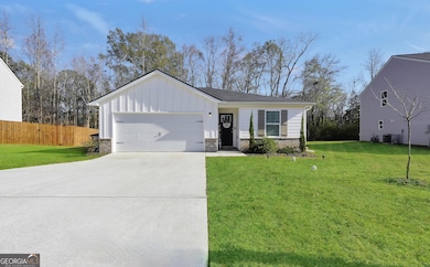 135 Catalpa Rd, Milner, GA 30257 - photo 2