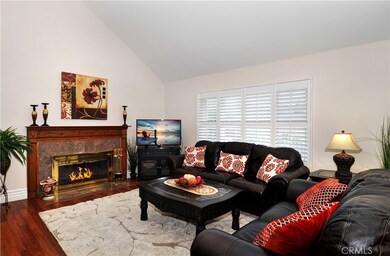 Wood burning marble fireplace with hand-crafted Oak surround and mantel