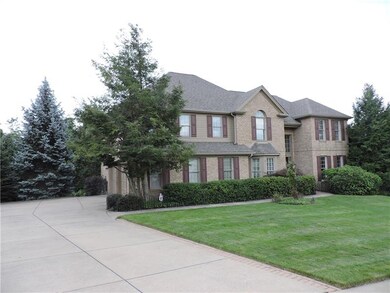 Large cement driveway to attached garages for easy